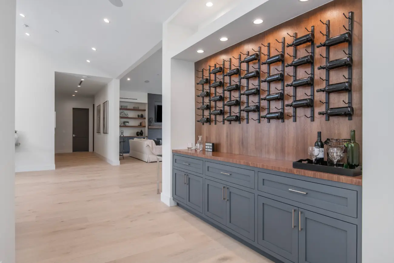 shelves-filled-with-bottles-against-a-wall-in-a-mo-2026-01-08-00-25-15-utc